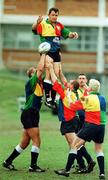 8 June 1999; Dion O'Cuinneagain, gets the ball away to  scrum half Ciarán Scally with help from Jeremy Davidson, left, and Peter Clohessy during Ireland Rugby squad training at Brisbane Grammar School in Brisbane, Queensland, Australia. Photo by Matt Browne/Sportsfile