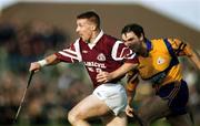 24 October 1999; Jamesie O'Connor of St Joseph's Doora Barefield in action against John O'Connell of Sixmilebridgeduring the Clare County Senior Club Hurling Championship Final match between Sixmilebridge and St Joseph's Doora Barefield at at Hennessy Park, Miltown Malbay, Clare. Photo by Damien Eagers/Sportsfile