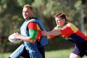 29 May 1999; Jeremy Davidson is tackled by Brian O'Driscoll during Ireland Rugby Squad training at the Central Coast Grammer School, Terrigal, New South Wales, Australia. Photo by Matt Browne/Sportsfile