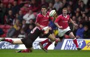 28 November 1999; Jeremy Staunton of Munster in action against Jeremy Thompson of Saracens during the Heineken Cup Pool 4 match at Vicarage Road in Watford, London. Photo by Brendan Moran/Sportsfile