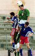 22  November 1999; Jim Goodwin of Republic of Ireland in action against Andreas Gerster, left and Ronny Buchel of Liechenstein during the UEFA Under 18 Championship Preliminary Round match between Republic of Ireland and Liechenstein at the National Stadium in Ta' Qali, Malta. Photo by David Maher/Sportsfile