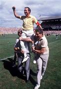 6 August 1989; Antrim manager Jim Nelson is held aloft in the celebrations after the  All-Ireland Senior Hurling Championship Semi-Final match between Antrim and Offaly at Croke Park in Dublin. Photo by Ray McManus/Sportsfile