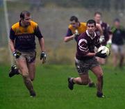 27 November 1999; Joe Keane of Crossmolina gets past Fergal O'Donnell of Roscommon Gaels during the AIB Connacht Senior Club Football Championship Final Replay match at St Tiernan's Park in Crossmolina, Mayo. Photo by David Maher/Sportsfile