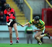 31 October 1999; John Kingston of UCC is blocked bown by John Browne of Blackrock during the Cork County Senior Club Hurling Championship Final match between Blackrock and UCC at Páirc Uí Chaoimh in Cork. Photo by Brendan Moran/Sportsfile