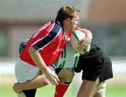 14 August 1999; John Kelly of Munster is tackled by Colm Rigney of Connacht during the Guinness Interprovincial Championship match between Connacht and Munster at the Sportsground in Galway. Photo by Brendan Moran/Sportsfile