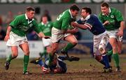 3 March 2000; John Kelly of Ireland, supported by team-mate Killian Keane, left, and Matt Mostyn, is tackled by Ezio Galon and Corado Pilat of Italy during the Six Nations A Rugby Championship match between Ireland and Italy at Donnybrook Stadium in Dublin. Photo by Matt Browne/Sportsfile