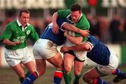 3 March 2000; John Kelly of Ireland  is tackled by Carlo Gatti, left, and Diego Colli of Italy during the Six Nations A Rugby Championship match between Ireland and Italy at Donnybrook Stadium in Dublin. Photo by Aoife Rice/Sportsfile