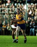 24 October 1999; John Reddan of Sixmilebridge in action against Noel Brodie of St Joseph's Doora Barefield during the Clare County Senior Club Hurling Championship Final match between Sixmilebridge and St Joseph's Doora Barefield at at Hennessy Park, Miltown Malbay, Clare. Photo by Damien Eagers/Sportsfile