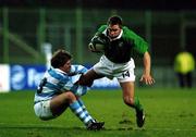 20 October 1999; Justin Bishop of Ireland is tackled by Eduardo Simone of Argentina during the 1999 Rugby World Cup Quarter-Final Play-Off match between Argentina and Ireland at Stade Felix Bollaert in Lens, France. Photo by Brendan Moran/Sportsfile