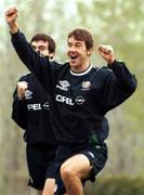 16 November 1999; Kenny Cunningham celebrates a score during a head tennis game during a Republic of Ireland training session at Veledrom Stadium in Bursa, Turkey. Photo by David Maher/Sportsfile *** Local Caption ***