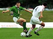21 July 1999; Liam Miller of Republic of Ireland in action against Ediki Sajaia of Georgia during the Under 18 Championship Group B Round 2 match between Republic of Ireland and Georgia at the Grosvard Stadium in Finspang, Sweden. Photo by David Maher/Sportsfile
