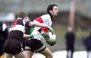 12 December 1999; Liam Murphy of UCC in action against Kieran O'Mahoney of Doonbeg during the AIB Munster Senior Club Football Championship Final match between UCC and Doonbeg at the Gaelic Grounds in Limerick. Photo by Brendan Moran/Sportsfile