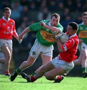 30 October 1999; Michael O'Sullivan of Cork in action against Séamus Moynihan of Kerry during the Church & General National Football League Division 1A Round 1 match between Cork and Kerry at Páirc Uí Rinn in Cork. Photo by Brendan Moran/Sportsfile
