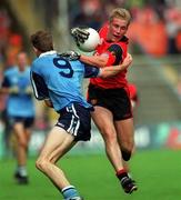 29 August 1999; Michael Walsh of Down in action against Kevin Devine of Dublin during the All-Ireland Minor Football Championship Semi-Final match between Dublin and Down at Croke Park in Dublin. Photo by Brendan Moran/Sportsfile *** Local Caption *** league