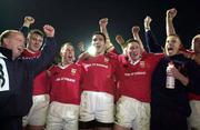 28 November 1999; Munster players including, from left, David Wallace, Peter Stringer, Jeremy Staunton and Ronan O'Gara and coach Declan Kidney, far left, celebrate after the Heineken Cup Pool 4 match at Vicarage Road in Watford, London. Photo by Brendan Moran/Sportsfile