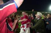 28 November 1999; Munster captain Mick Galwey and his daughter celebrate after the Heineken Cup Pool 4 match at Vicarage Road in Watford, London. Photo by Brendan Moran/Sportsfile