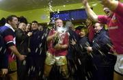 8 January 2000; Munster captain Mick Galwey celebrates with champagne in the dressing room after the Heineken Cup Pool 4 Round 5 match between Munster and Saracens at Thomond Park in Limerick. Photo by Matt Browne/Sportsfile