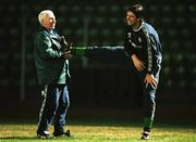 16 November 1999; Niall Quinn with team physio Mick Byrne during a Republic of Ireland training session at Veledrom Stadium in Bursa, Turkey. Photo by David Maher/Sportsfile