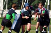 28 May 1999; Paddy Johns is tackled by Mike Mullins, left, and David Corkery during Ireland Rugby squad training at the Shore School Playing Fields in Northbridge, Sydney, Australia. Photo by Matt Browne/Sportsfile