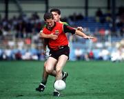 11 August 1991; Paddy O'Rourke of Down is tackled by John Cronin of Kerry during the All-Ireland Senior Football Championship Semi-Final between Down and Kerry at Croke Park in Dublin. Photo by Ray McManus/Sportsfile