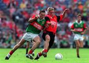 26 September 1999; Paul Coady of Mayo in action against Michael Walsh of Down during the All-Ireland Minor Football Championship Finall match between Down and Mayo at Croke Park in Dublin. Photo by Ray Lohan/Sportsfile