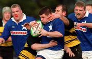 26 February 2000; Peter Smyth of St Mary's is tackled by Mike Prendergast, left, and Peter Clohessy, right, of Young Munster during the AIB League Division 1 match between St Mary's and Young Munster at Templeville Road in Dublin. Photo by Matt Browne/Sportsfile