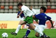 23 July 1999; Richie Baker of Republic of Ireland is tackled by Fabio Caselli of Italy during the 1999 UEFA European Under 18 Championship Group B Round 3 match between Republic of Ireland and Italy at Idrottsparken Stadium in Norrkoping, Sweden. Photo by David Maher/Sportsfile