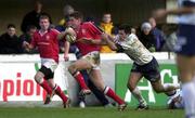 11 December 1999; Ronan O'Gara of Munster in action against Sebastien Roque of Colomiers during the Heineken Cup Pool 4 Round 3 match between Colomiers and Munster at Stade Toulousien in Toulouse, France. Photo by Brendan Moran/Sportsfile