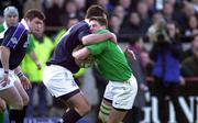 19 February 2000; Ronan O'Gara of Ireland is tackled by Martin Leslie of Scotland during the Lloyds TSB 6 Nations match between Ireland and Scotland at Lansdowne Road in Dublin. Photo by Brendan Moran/Sportsfile