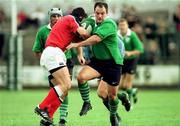 10 September 1999; Ross Nesdale of Ireland is tackled by Kevin O'Riordan of Munster during the Representive Match between Munster and Ireland at Musgrave Park in Cork. Photo by Ray Lohan/Sportsfile