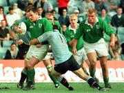 6 June 1999; Ross Nesdale of Ireland is tackled by Matt Dowling of New South Wales during the New South Wales v Ireland match at the Sydney Football Stadium, New South Wales, Australia. Photo by Matt Browne/Sportsfile