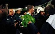 17 November 1999; Roy Keane of Republic of Ireland is led off the pitch by riot police after the UEFA European Championships Qualifier Play-Off Second Leg match between Turkey and Republic of Ireland at Ataturk Stadium in Bursa, Turkey. Photo by David Maher/Sportsfile