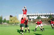 19 October 1999; Jeremy Davidson takes the ball in the line out with help from Reggie Corrigan and Paul Wallace during Ireland Rugby squad training on the back pitch of the Stade Felix Bollaert in Lens, France. Photo by Matt Browne/Sportsfile