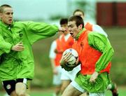 6 April 1999; Ryan Casey in action against Barry Quinn, left, in a game of gaelic football during a Republic of Ireland U20 Squad training sesssion at the Liberty Stadium in Ibadan, Nigeria. Photo by David Maher/Sportsfile