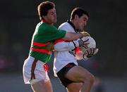 20 November 1999; Séamus Downey of UCC in action against Joe Murray of Rathgormack during the AIB Munster Senior Club Football Championship Semi-Final match between Rathgormack and UCC at Páirc Uí Rinn in Cork. Photo by Damien Eagers/Sportsfile