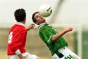 24 November 1999; Shaun Byrne of Republic of Ireland in action against Adrian Farrugia of Malta during the UEFA Under-18 Championship Preliminary Round match between Malta and Republic of Ireland at Hibernians Football Ground in Paola, Malta. Photo by David Maher/Sportsfile