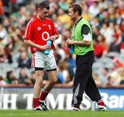 19 August 2007; Donncha O'Connor, Cork, takes a drink from team-mate and acting &quot;Maor Uisce&quot; James Masters. Bank of Ireland All-Ireland Senior Football Championship Semi-Final, Meath v Cork, Croke Park, Dublin. Picture credit; Brendan Moran / SPORTSFILE *** Local Caption ***
