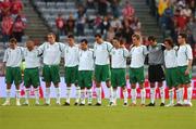 22 August 2007; Republic of Ireland players stand for a minute silence before the game in respect of the late Tom Staunton, father of Republic of Ireland manager Steve Staunton. International Friendly, Denmark v Republic of Ireland, Atletion Stadium, Aarhus, Denmark. Picture credit: David Maher / SPORTSFILE