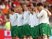 22 August 2007; Republic of Ireland players stand for a minute silence in respect of the late Tom Staunton, father of Republic of Ireland manager Steve Staunton. International Friendly, Denmark v Republic of Ireland, Atletion Stadium, Aarhus, Denmark. Picture credit: David Maher / SPORTSFILE
