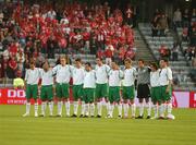 22 August 2007; Republic of Ireland players stand for a minute silence in respect of the late Tom Staunton, father of Republic of Ireland manager Steve Staunton. International Friendly, Denmark v Republic of Ireland, Atletion Stadium, Aarhus, Denmark. Picture credit: David Maher / SPORTSFILE