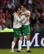 22 August 2007; Robbie Keane, left, Republic of Ireland, celebrates after scoring his side's second goal with team-mate John O'Shea. International Friendly, Denmark v Republic of Ireland, Atletion Stadium, Aarhus, Denmark. Picture credit: David Maher / SPORTSFILE
