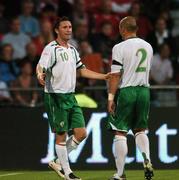 22 August 2007; Robbie Keane, left, Republic of Ireland, celebrates after scoring his side's second goal with team-mate Stephen Carr. International Friendly, Denmark v Republic of Ireland, Atletion Stadium, Aarhus, Denmark. Picture credit: David Maher / SPORTSFILE