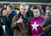 28 December 2014; Michael O'Leary from the Gigginstown House Stud with jockey Bryan Cooper after winning the Lexus Steeplechase with Road To Riches. Leopardstown Christmas Festival, Leopardstown, Co. Dublin. Photo by Sportsfile