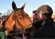 28 December 2014; Michael O'Leary from the Gigginstown House Stud kisses Road To Riches after winning the Lexus Steeplechase. Leopardstown Christmas Festival, Leopardstown, Co. Dublin. Photo by Sportsfile