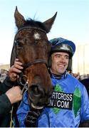 29 December 2014; Jockey Ruby Walsh with Hurricane Fly after winning the Ryanair Hurdle which was his 21st Grade 1 victory and a new world record. Leopardstown Christmas Festival, Leopardstown, Co. Dublin. Picture credit: Barry Cregg / SPORTSFILE