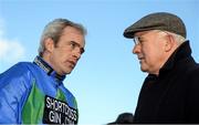29 December 2014; Jockey Ruby Walsh with his father Ted after he rode Hurricane Fly to win the Ryanair Hurdle which was his 21st Grade 1 victory and a new world record. Leopardstown Christmas Festival, Leopardstown, Co. Dublin. Picture credit: Barry Cregg / SPORTSFILE