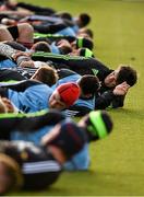 29 December 2014; Munster's Donncha O'Callaghan and team-mates stretch during squad training ahead of their Guinness PRO12, Round 12, match against Connacht on New Year's Day. Munster Rugby Squad Training, University of Limerick, Limerick. Picture credit: Diarmuid Greene / SPORTSFILE
