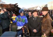 29 December 2014; Hurricane Fly with jockey Ruby Walsh, trainer Willie Mullins, right, groom Gail Carlisle, and owner George Creighton, after winning the Ryanair Hurdle, and his 21st Grade 1 victory which is a new world record. Leopardstown Christmas Festival, Leopardstown, Co. Dublin. Photo by Sportsfile