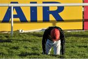 29 December 2014; Jockey D.G. Lavery recovers after falling off Jimmy Two Times on the final hurdle in The Ryanair European Breeders Fund Novice Handicap Hurdle. Leopardstown Christmas Festival, Leopardstown, Co. Dublin. Picture credit: Cody Glenn / SPORTSFILE