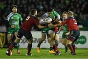 1 January 2015; Bundee Aki, Connacht, is tackled by CJ Stander, left, Ronan O'Mahony, centre, and BJ Botha, Munster. Connacht v Munster, Guinness PRO12 Round 12. Sportsground, Galway. Picture credit: Ramsey Cardy / SPORTSFILE